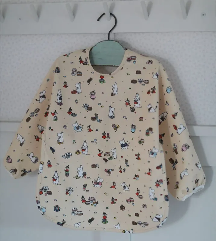 Bild 2 för Rätt Start Mumin Picknick Haklapp med ärm (Beige)